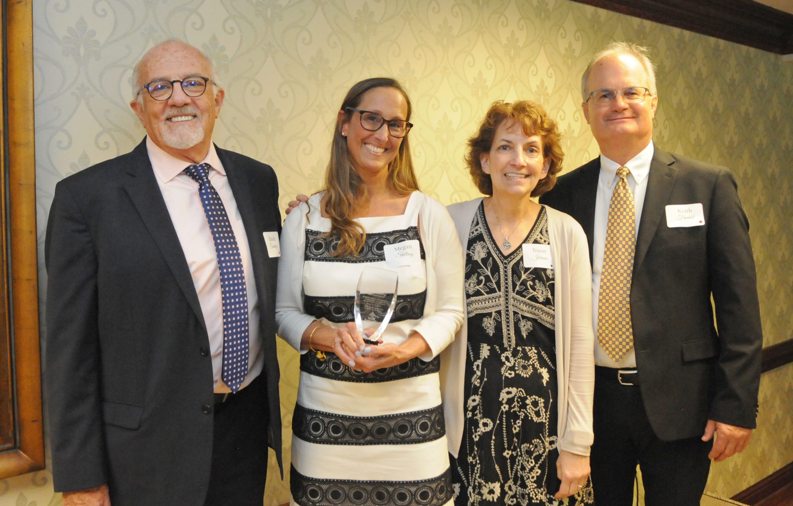 2025 Stephen W. Johnson Mission Award Winner Megan Shilling flanked by Concordia Board Vice Chairman Rande Casady, Tracey Johnson and Concordia President and CEO Keith Frndak